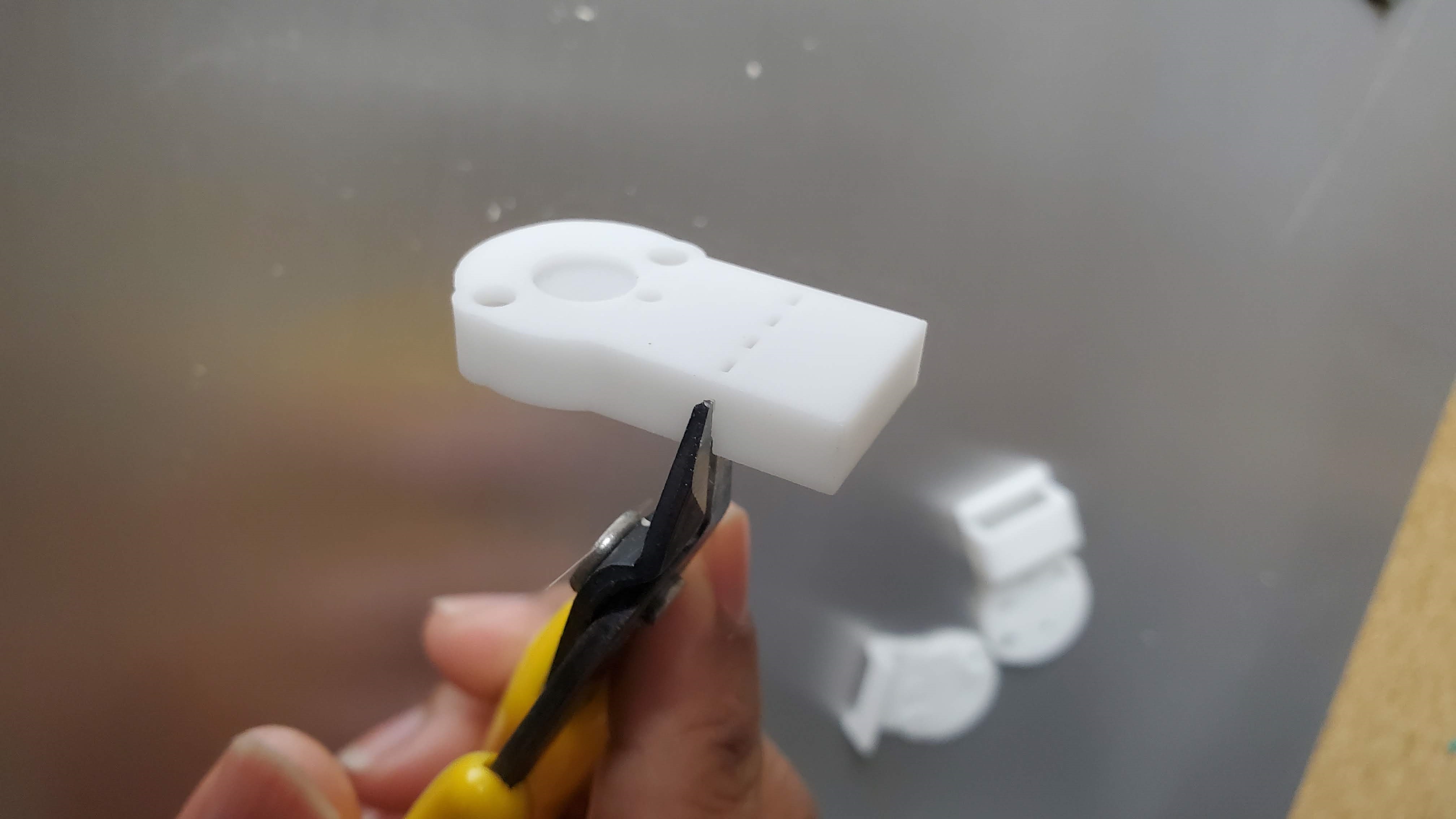 Canandmag casing being held by flush cutters